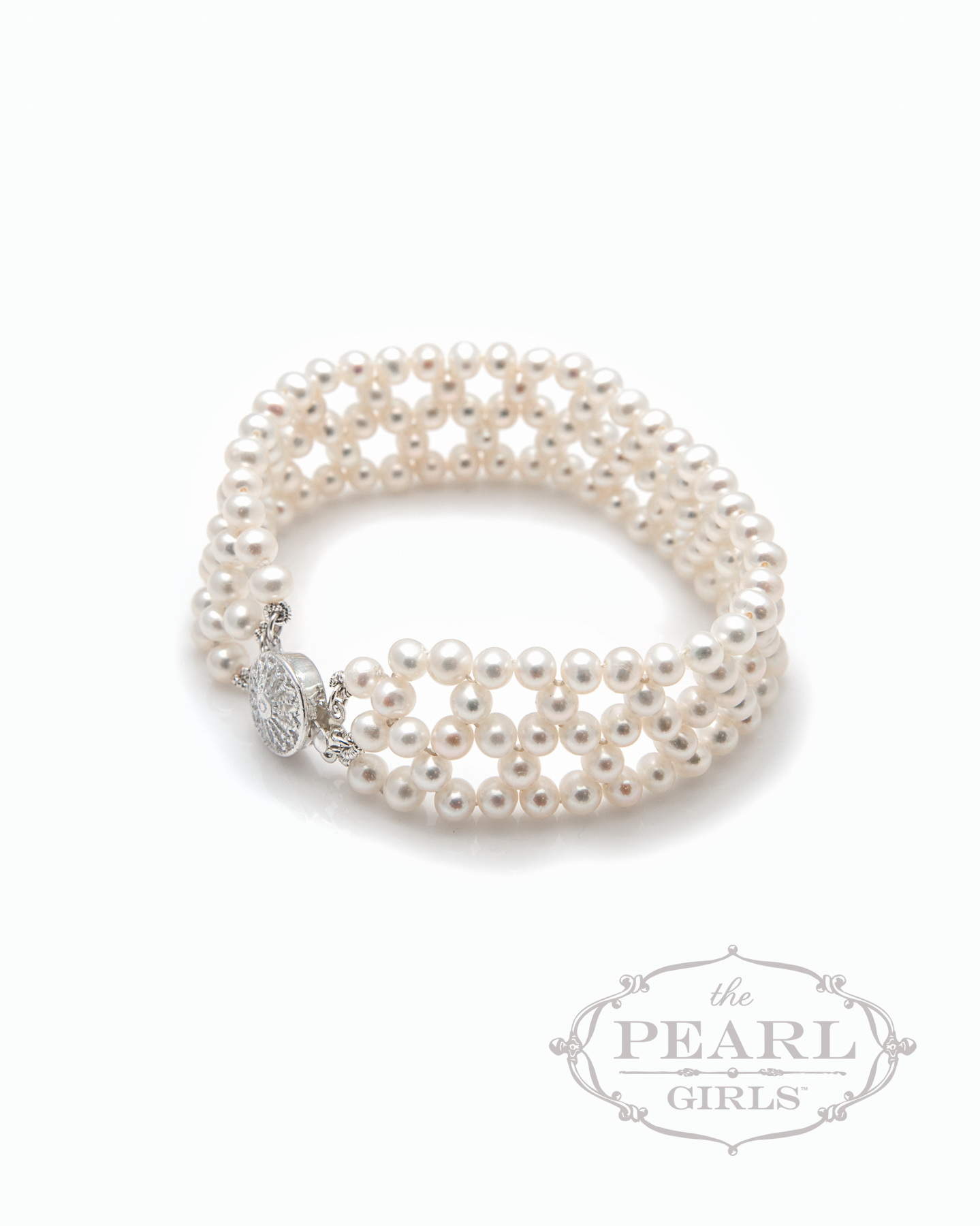 Paire de clous d'oreille "Perle" D. 7 mm, monture en or jaune 18 K (750 Paire de clous d'oreille "Perle" D. 7 mm, monture en or jaune 18 K (750