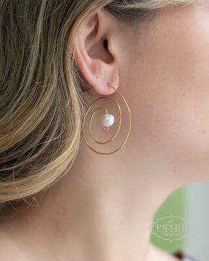 spiral pearl earrings on model by The Pearl Girls